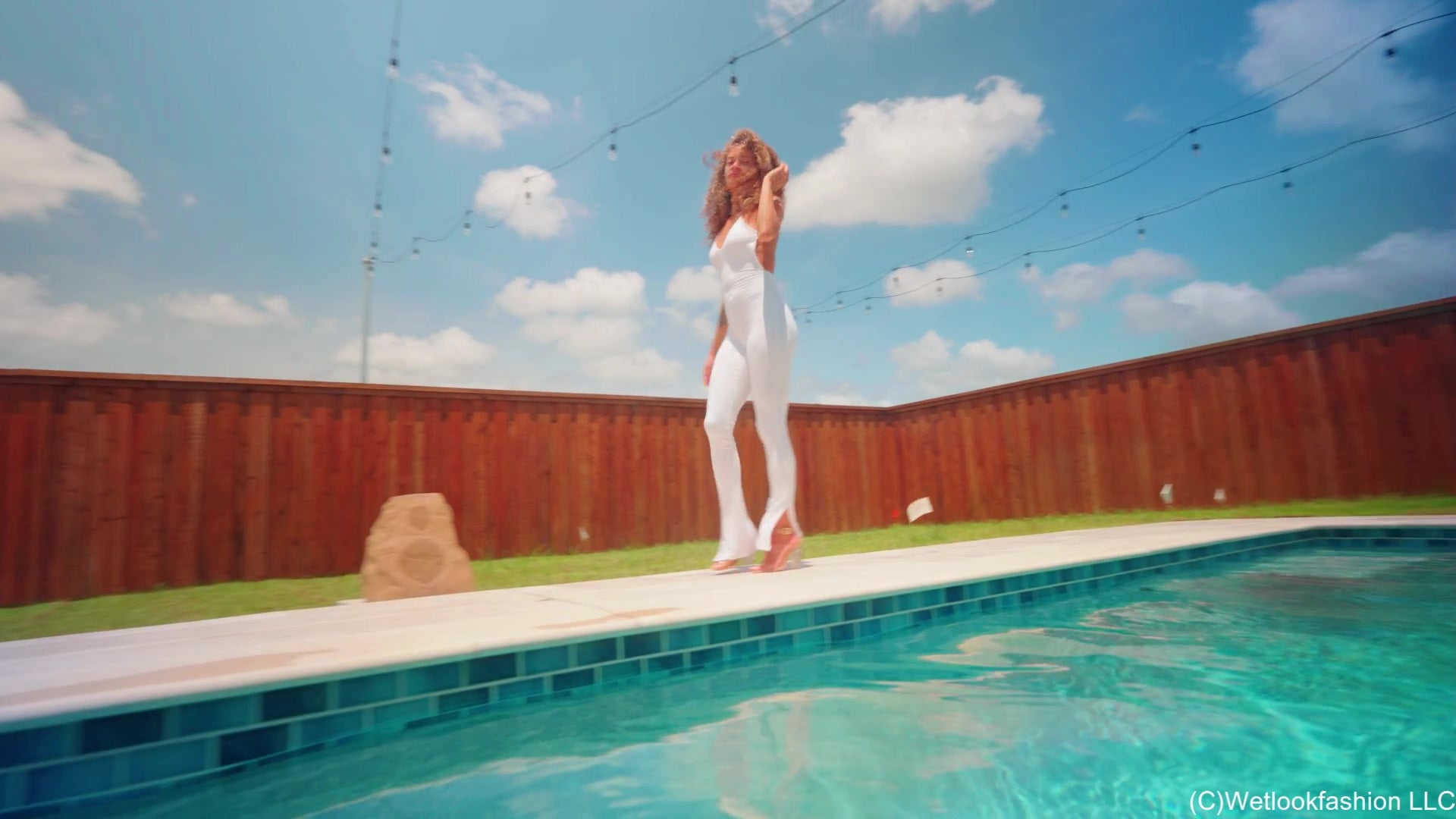 Jasmine Gets Wet in a White Jumpsuit and Heels