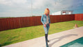 Jessica Goes for a Swim in Jeans and Shiny Boots