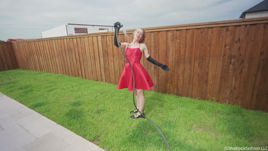 Jessica Has Some Pool Fun Wearing a Red Satin Dress
