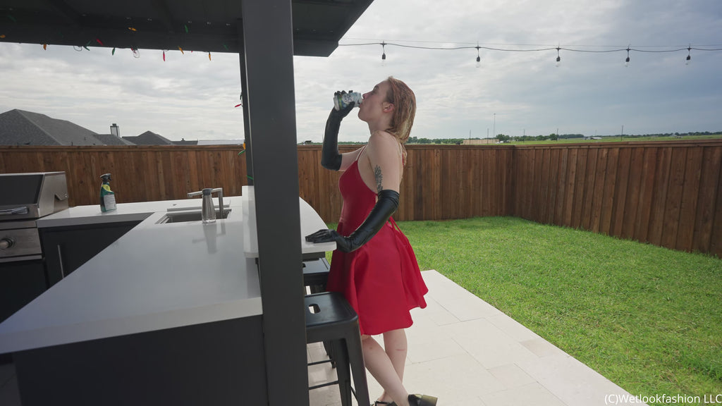 Jessica Has Some Pool Fun Wearing a Red Satin Dress