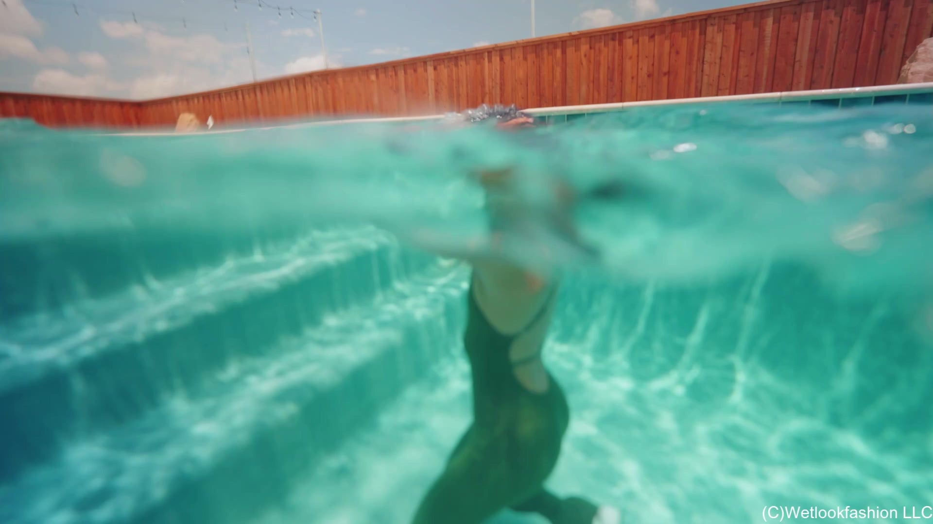 Jolissa Gets Wet in a Bombshell Jumpsuit
