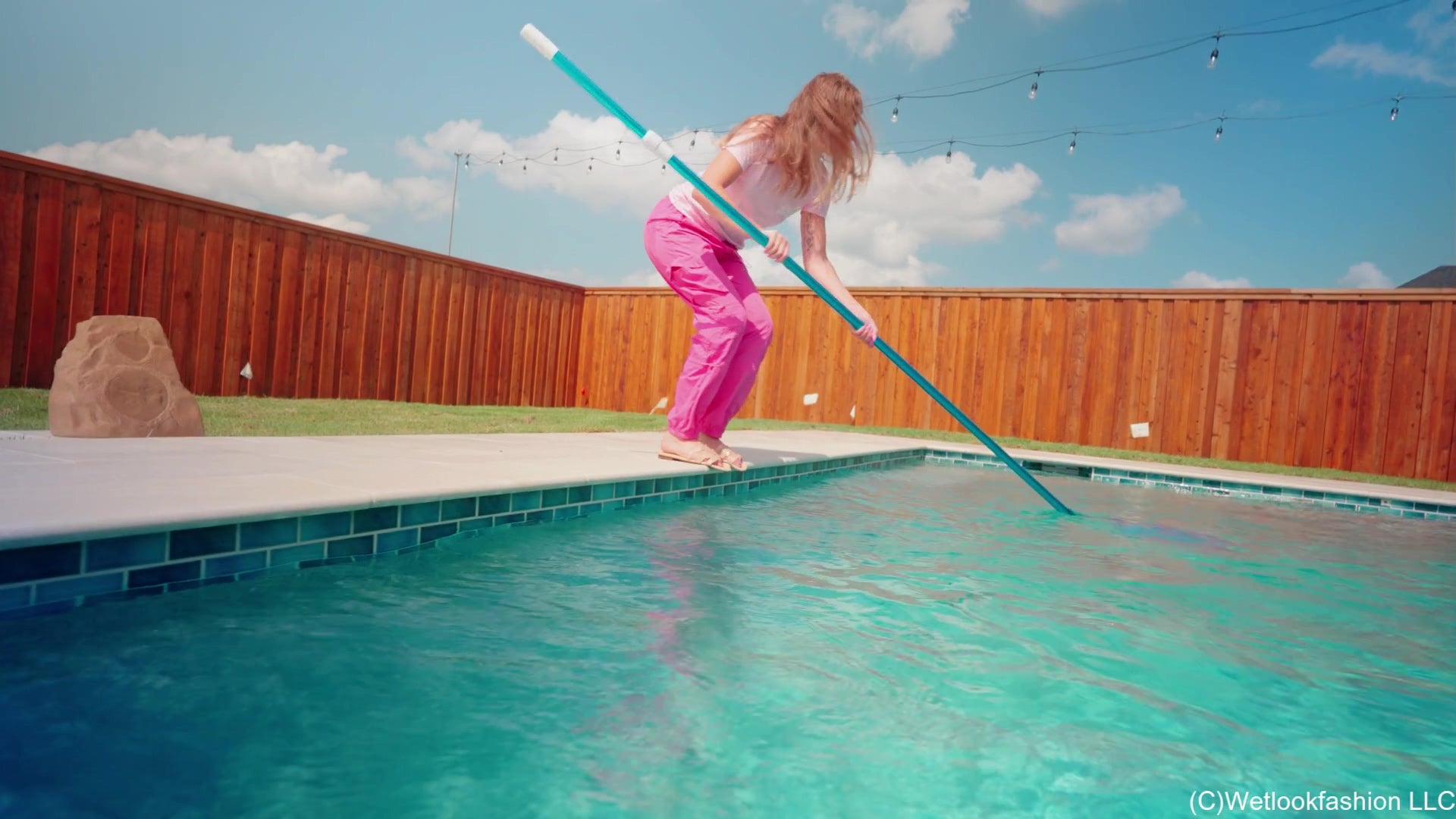 Joy Falls in the Pool In Cargo Pants and a T-shirt