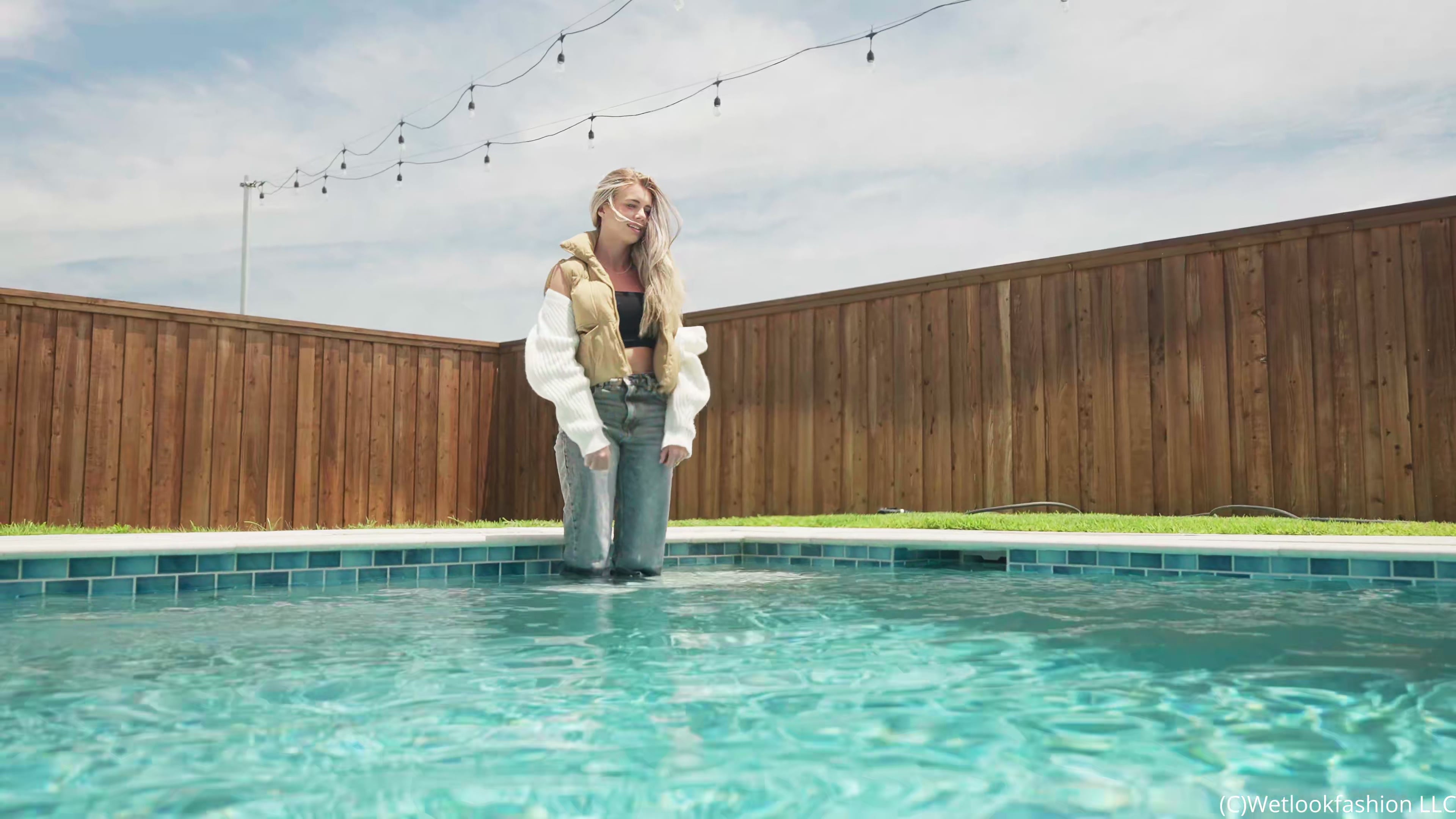 Joy Goes for a Swim in a Casual Jeans Outfit