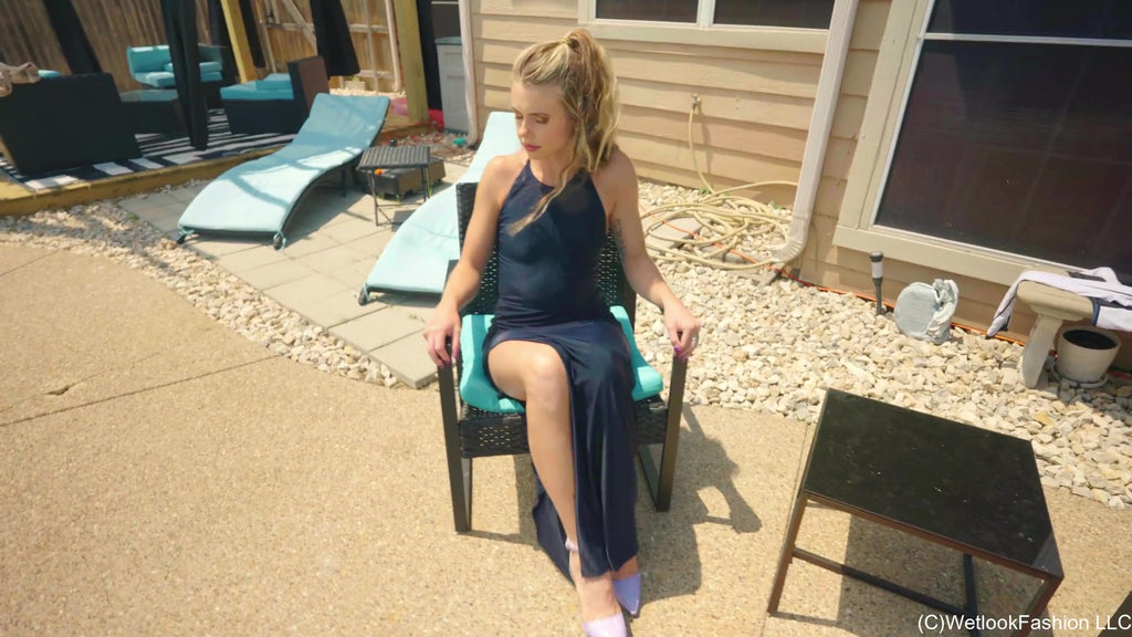 Joy in the Pool Wearing a Black Satin Dress