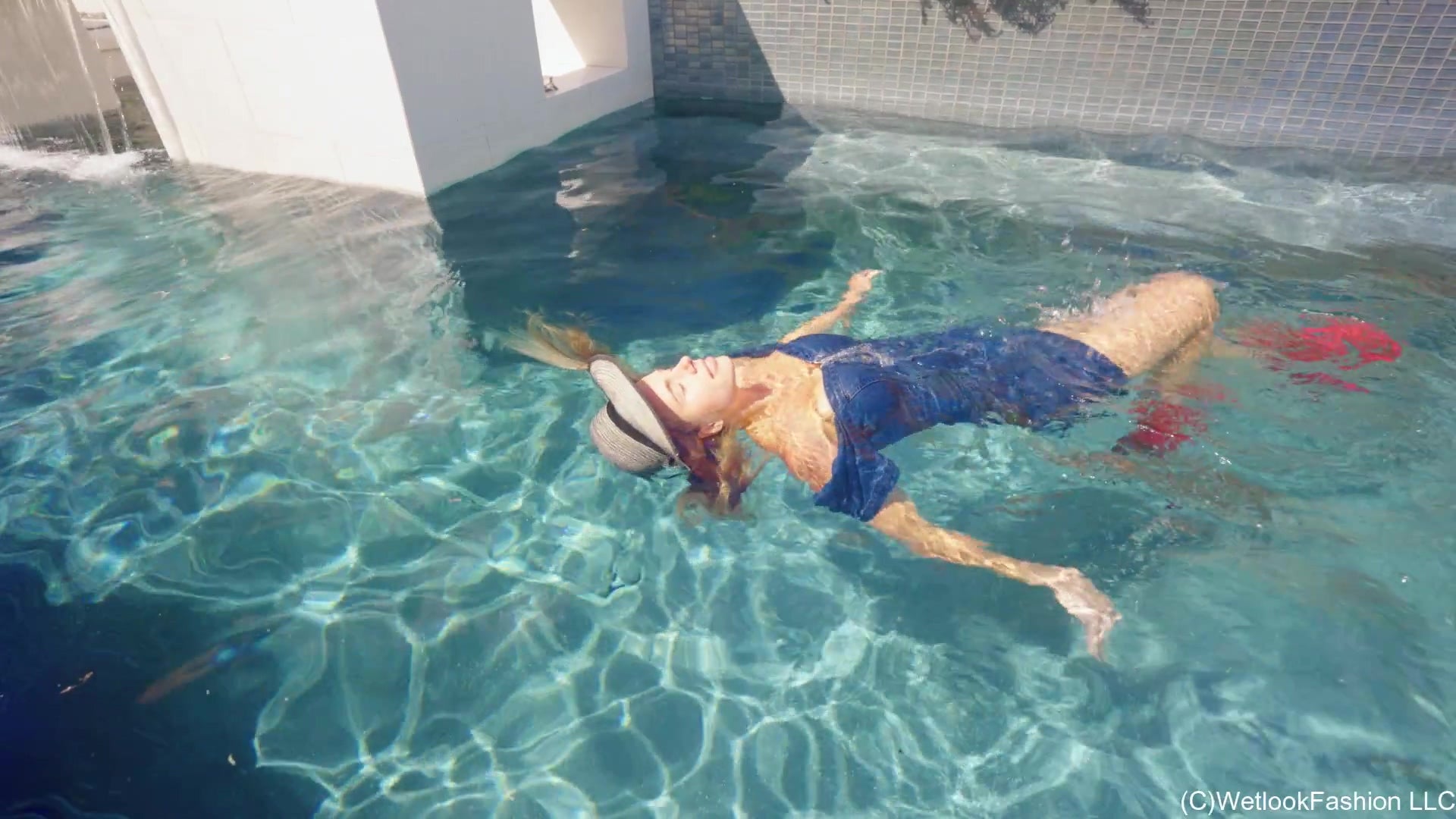Joy Swims in a Denim Dress and Cowgirl Boots