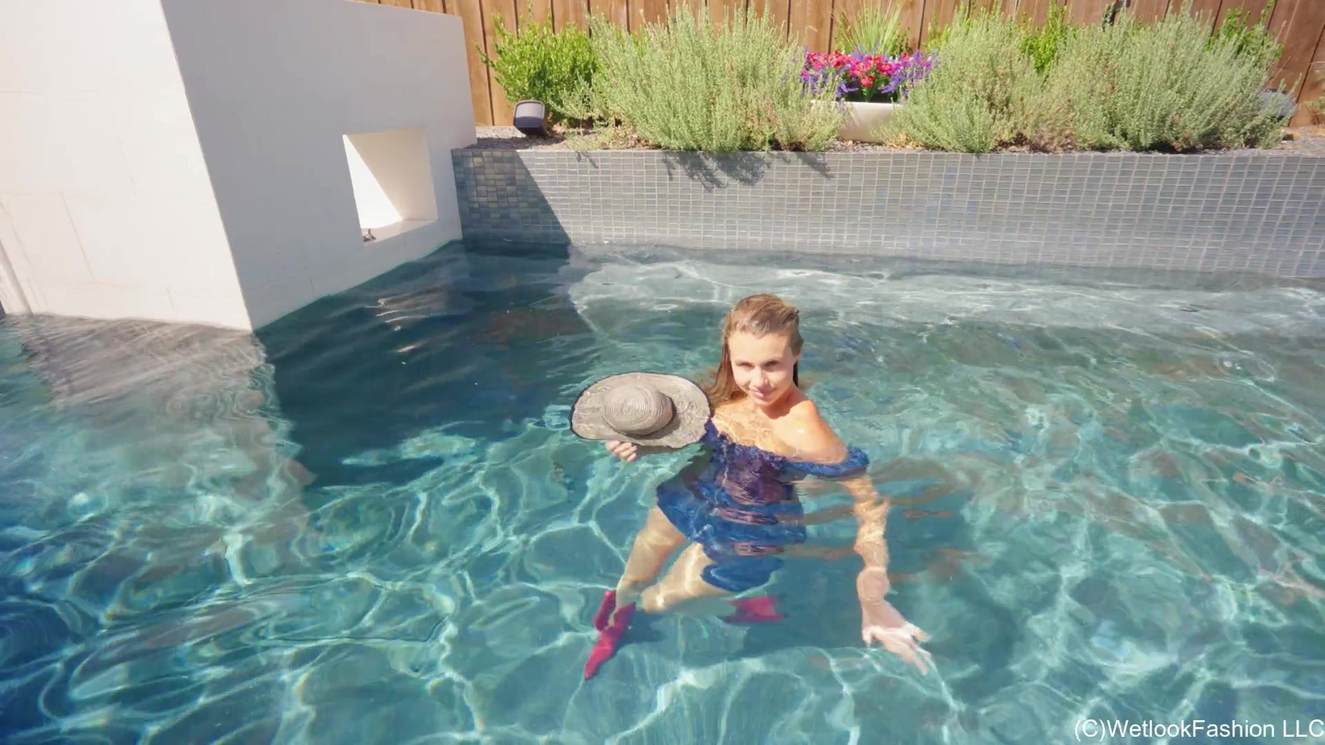Joy Swims in a Denim Dress and Cowgirl Boots