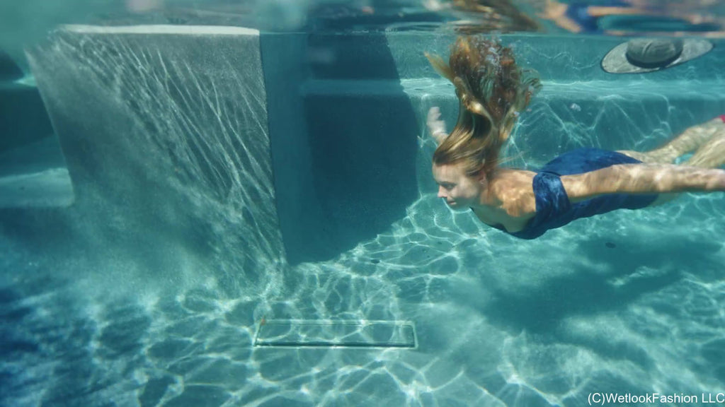Joy Swims in a Denim Dress and Cowgirl Boots