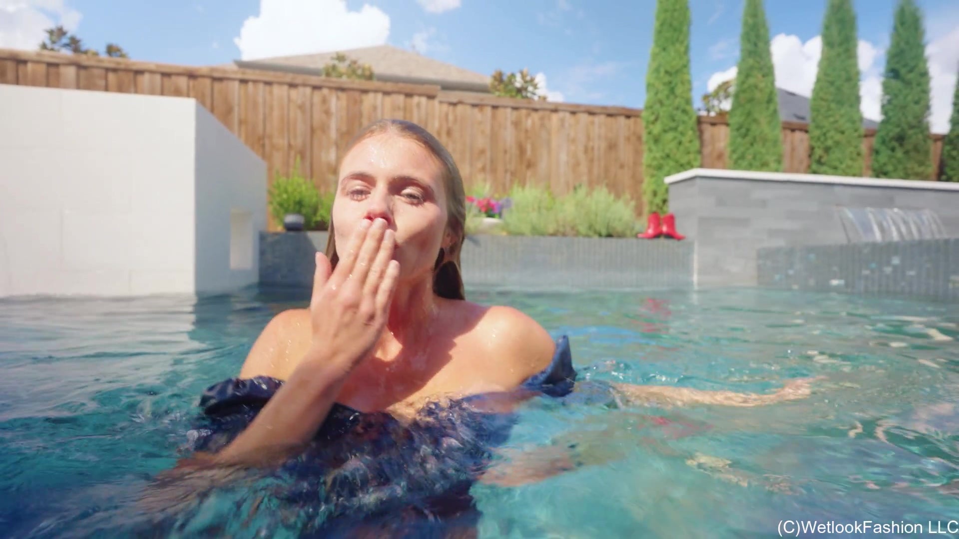 Joy Swims in a Denim Dress and Cowgirl Boots