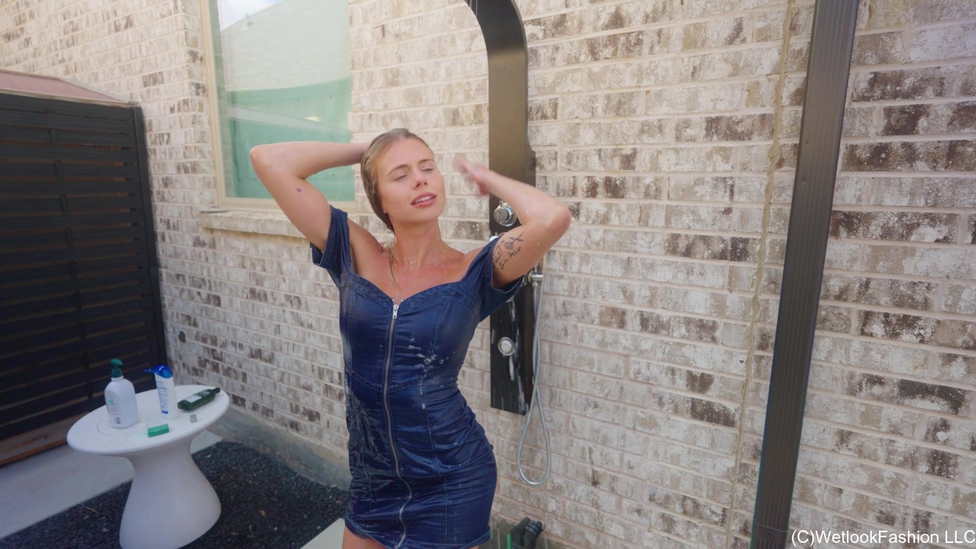 Joy Swims in a Denim Dress and Cowgirl Boots