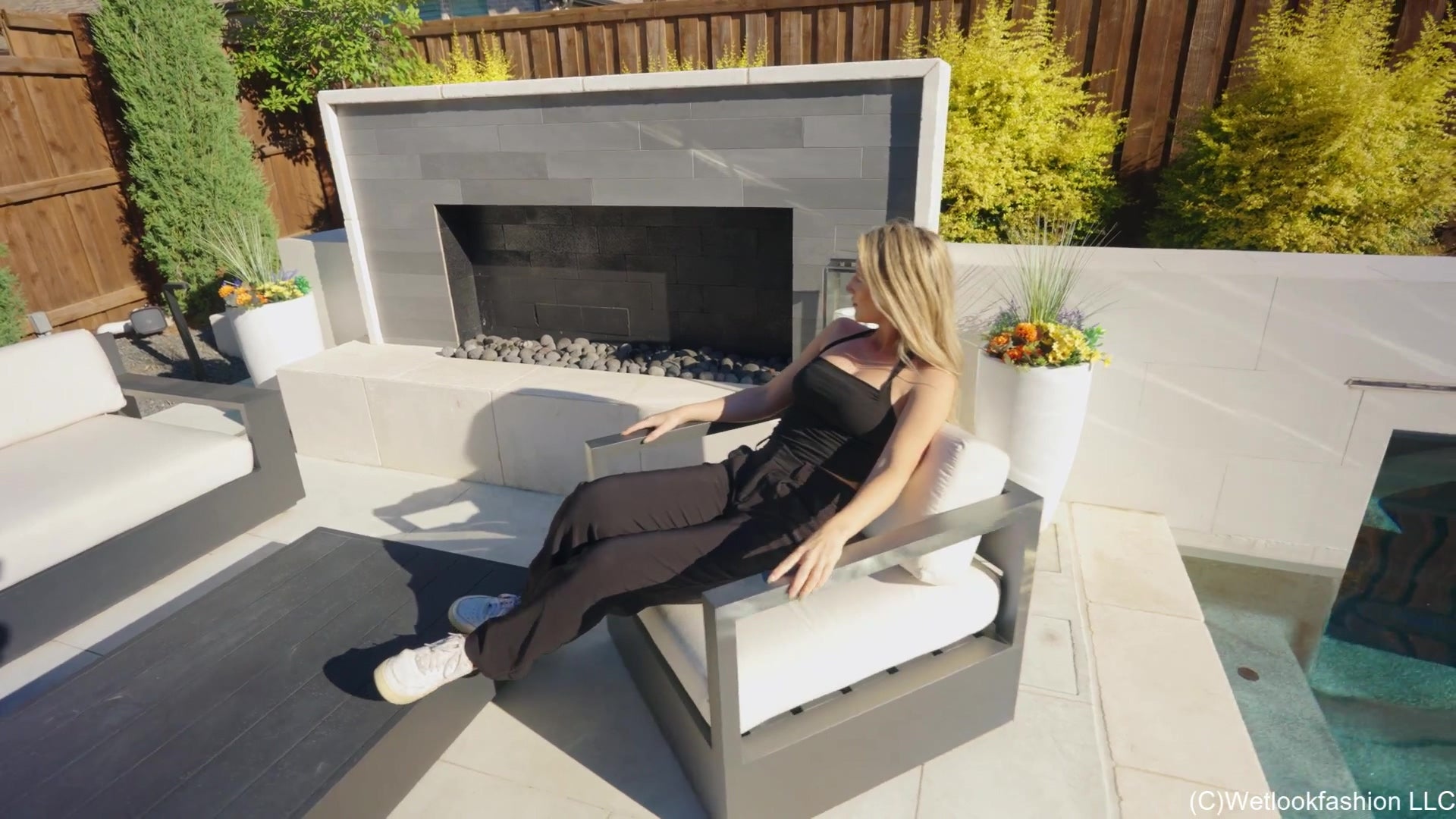 Kate Casuall Swims Wearing a Black Pant Outfit