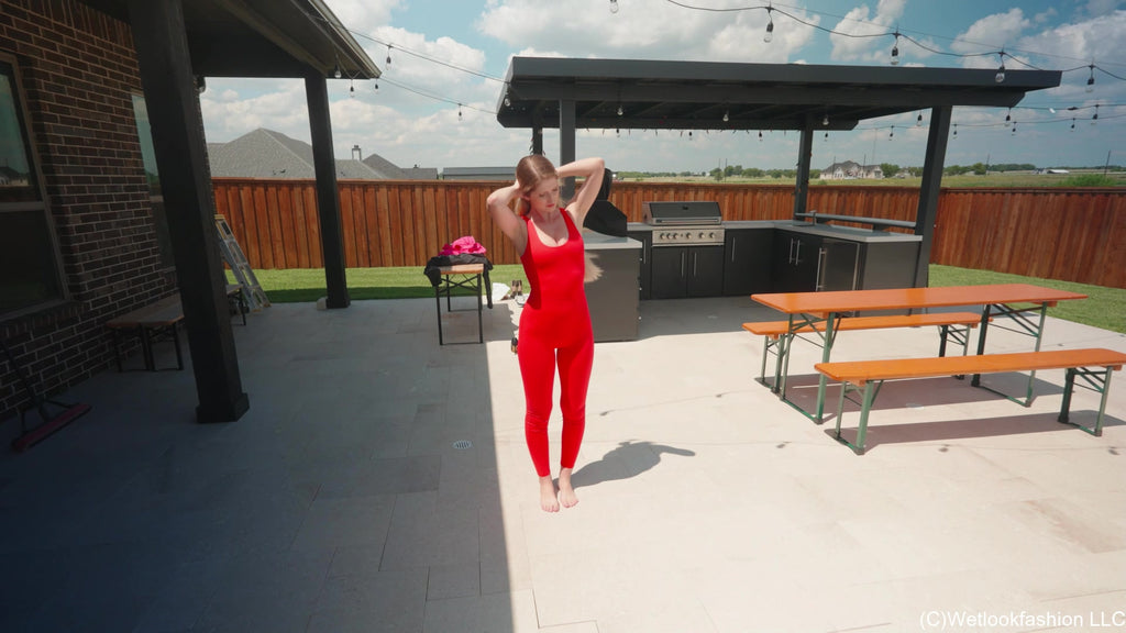 Kate Swims in a Red Jumpsuit