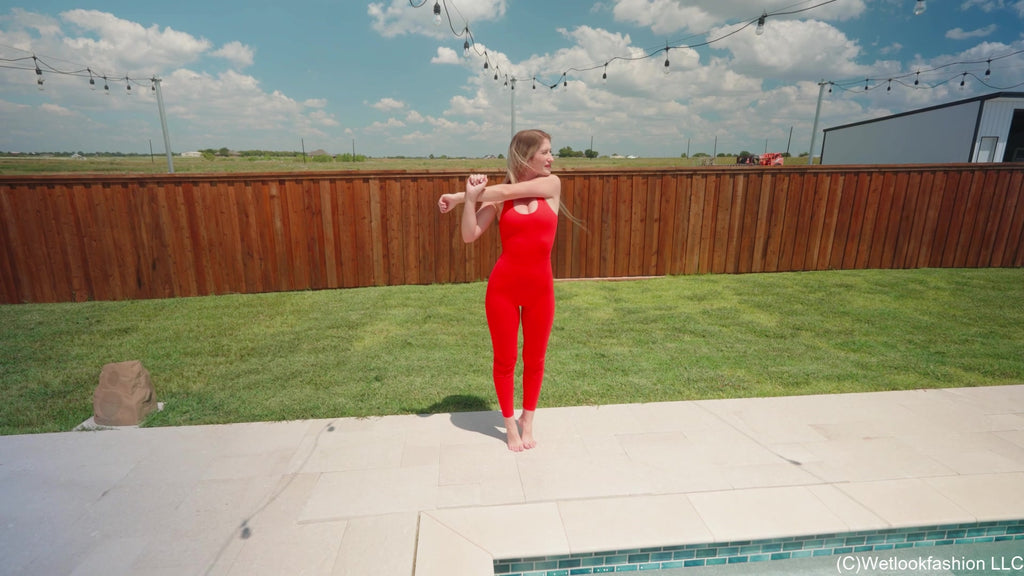 Kate Swims in a Red Jumpsuit