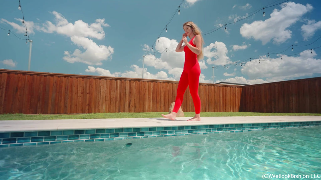 Kate Swims in a Red Jumpsuit