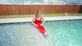 Kate Swims in a Red Jumpsuit
