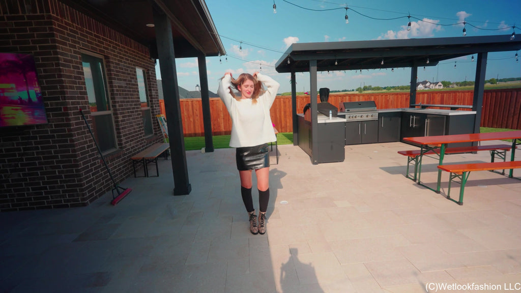 Kate Goes for a Swim in Leather, a Sweater, Socks and Boots