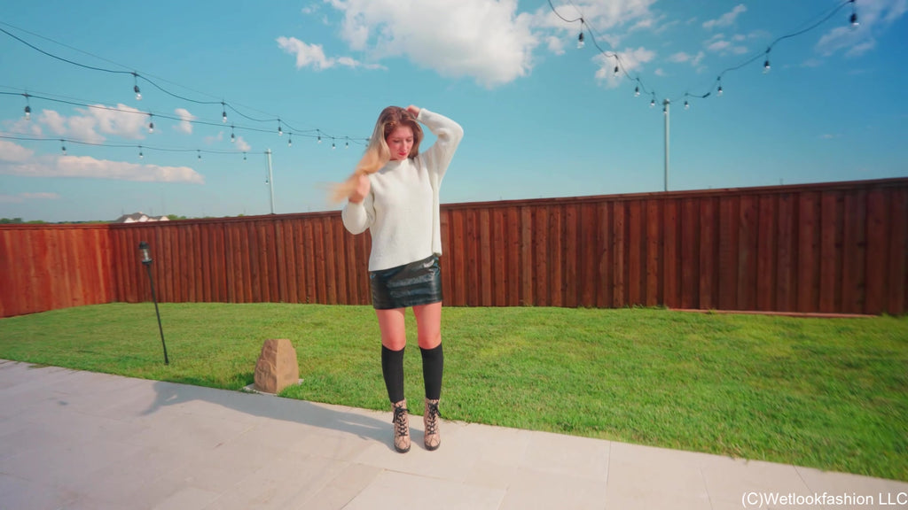 Kate Goes for a Swim in Leather, a Sweater, Socks and Boots
