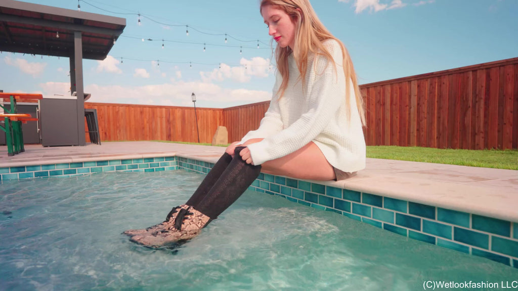 Kate Goes for a Swim in Leather, a Sweater, Socks and Boots