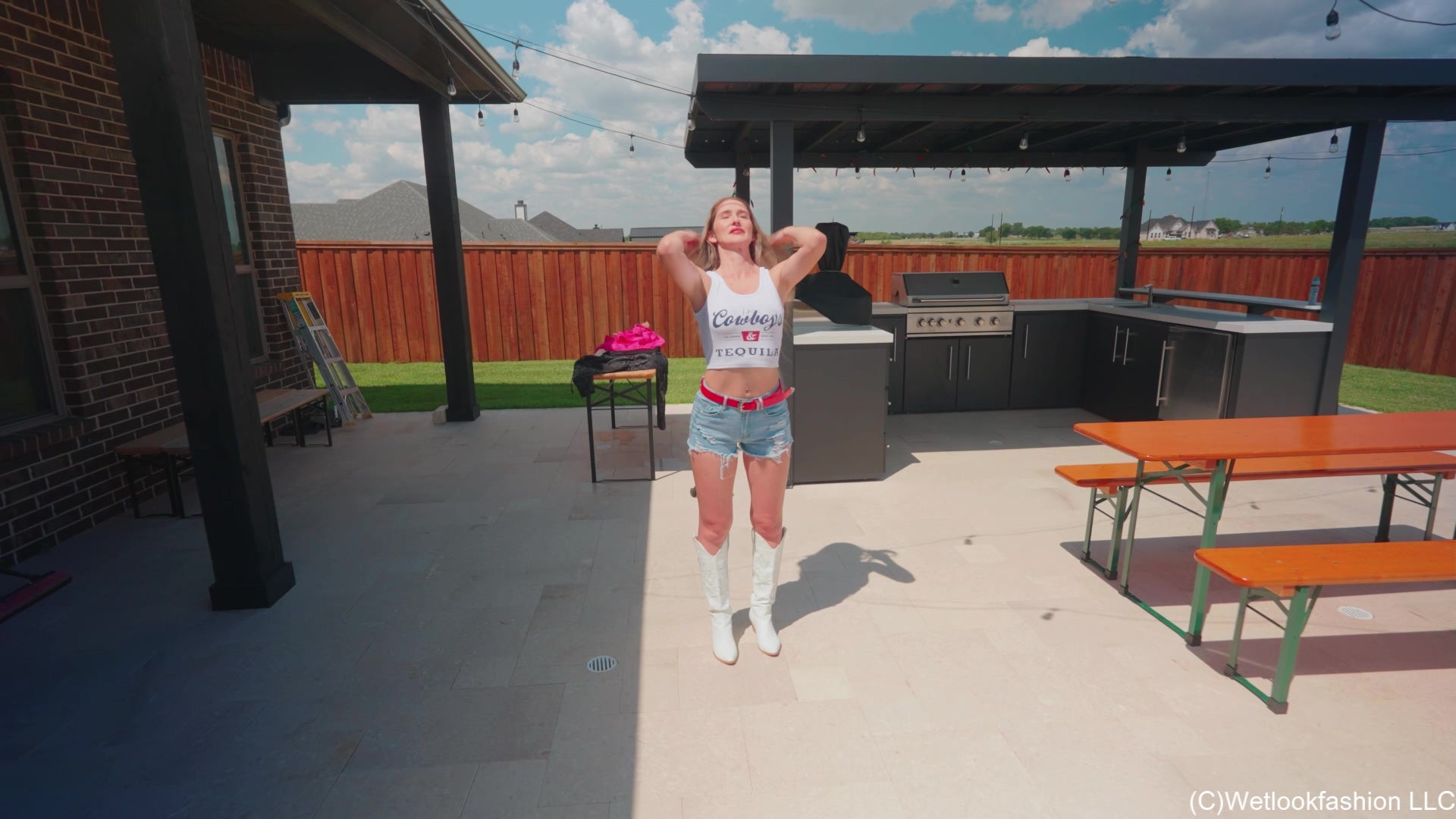 Kate Swims in a Jean Shorts, a White Top and Cowgirl Boots