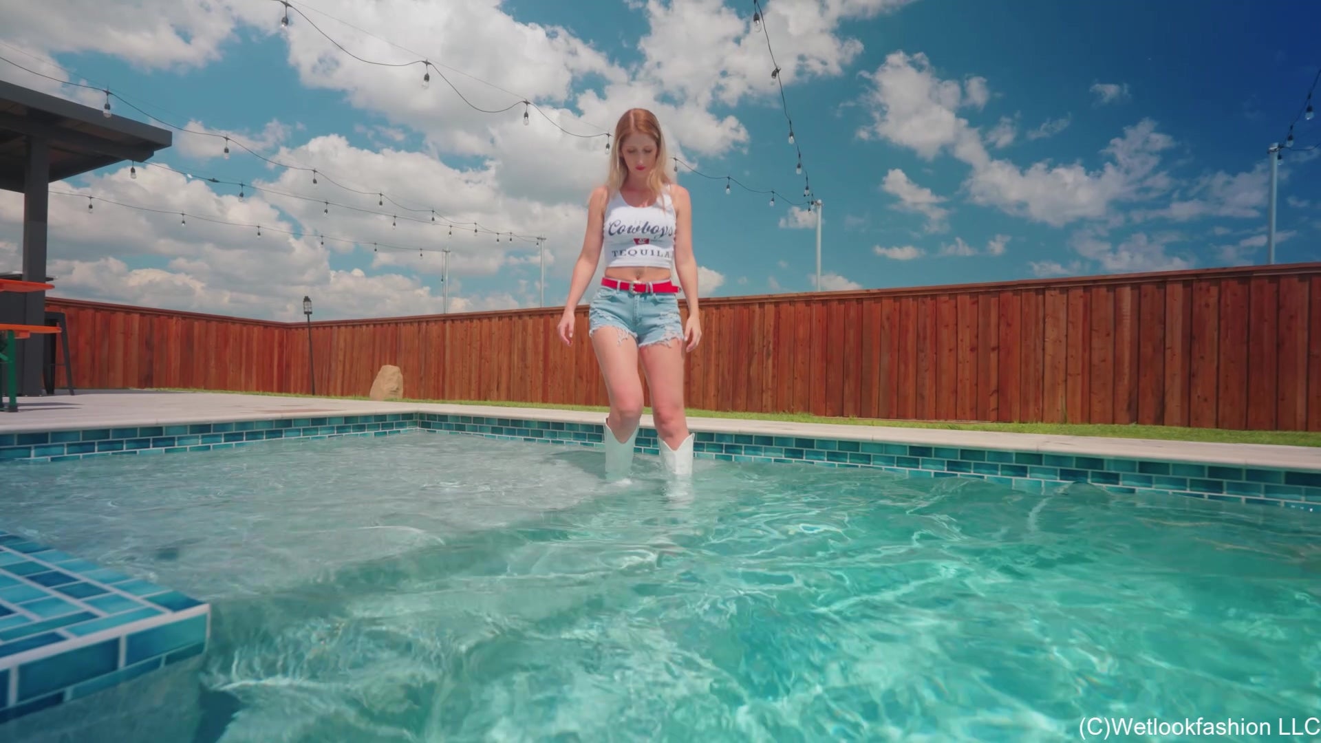Kate Swims in a Jean Shorts, a White Top and Cowgirl Boots