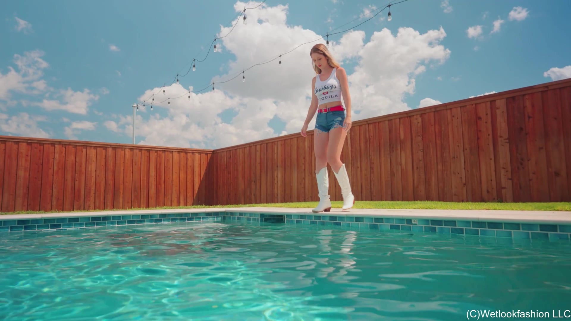 Kate Swims in a Jean Shorts, a White Top and Cowgirl Boots