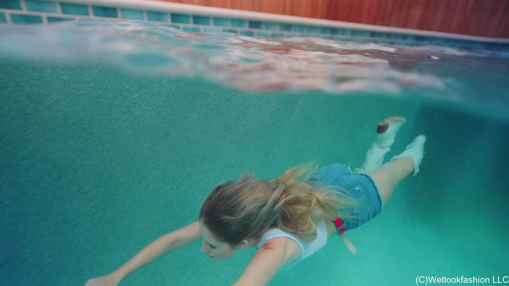 Kate Swims in a Jean Shorts, a White Top and Cowgirl Boots
