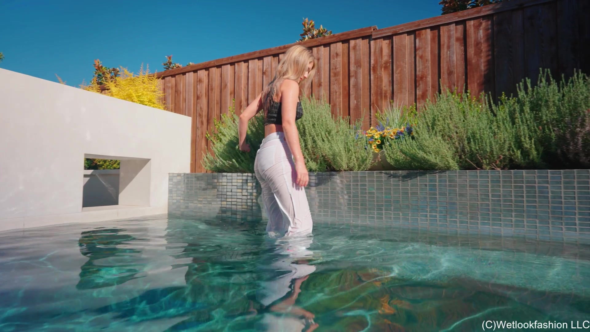 Kate's Morning Swim Wearing White Jeans, Top and Sneakers
