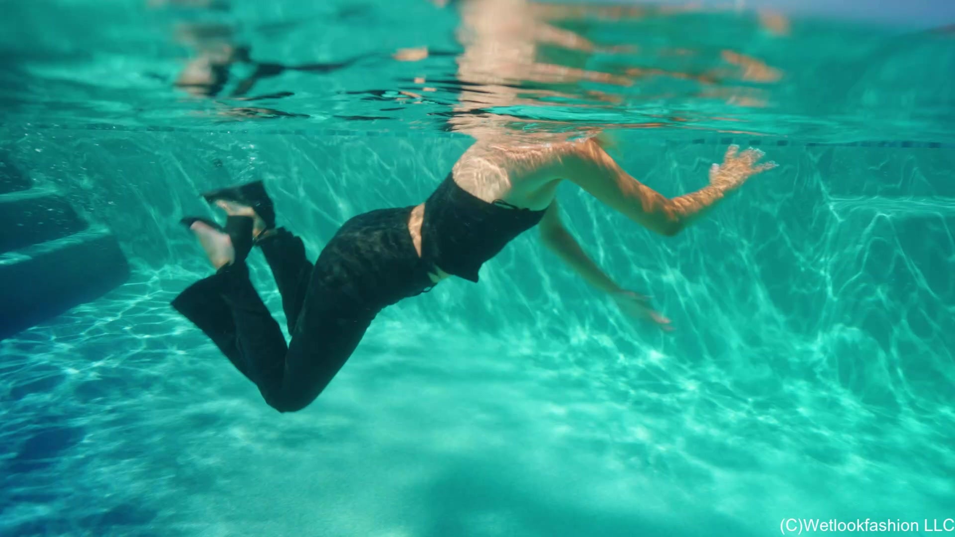 Katie Takes a Swim in Leather Pants and a Satin Top