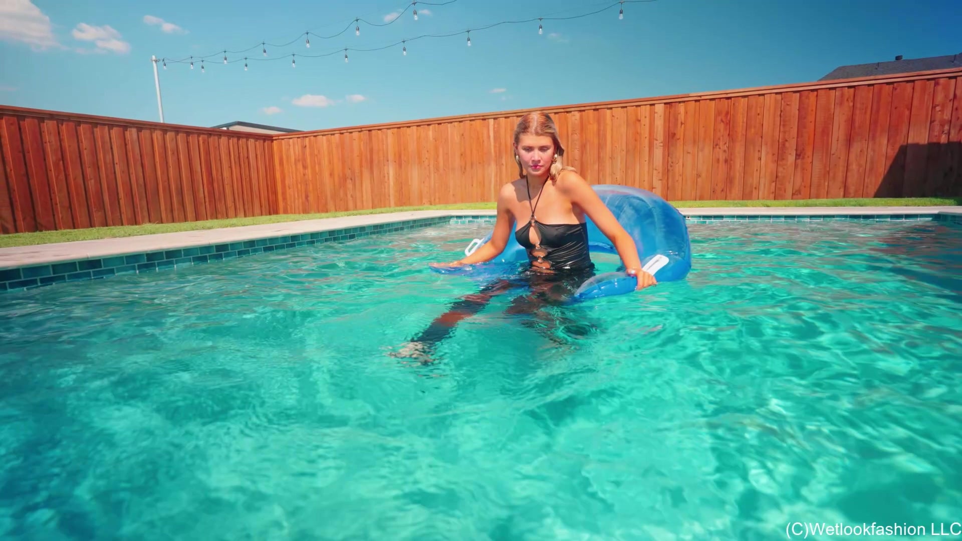Katie Takes a Swim in Leather Pants and a Satin Top