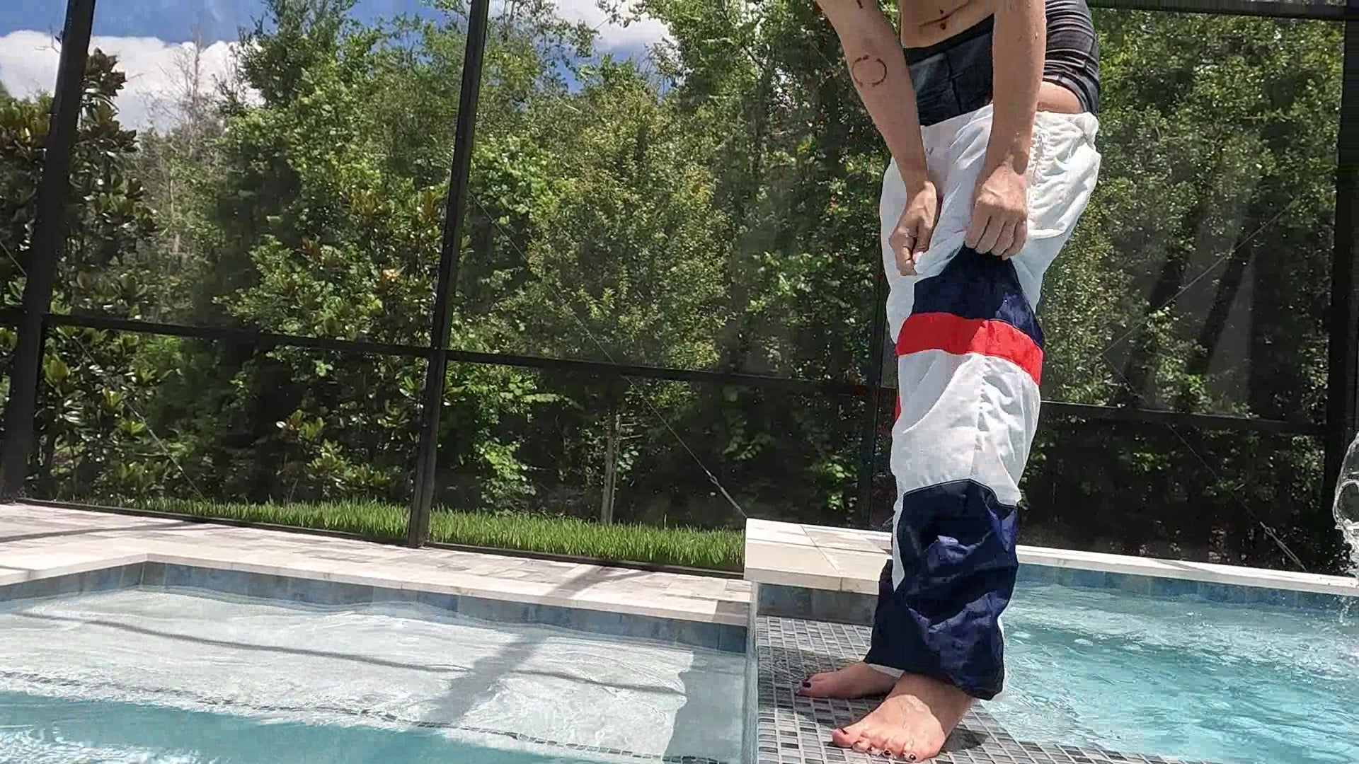 Kilo Swims in Two Nylon Outfits