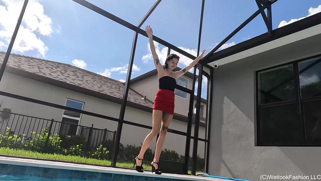 Kilo Takes a Dip in Her Red Mini Skirt and Black Top