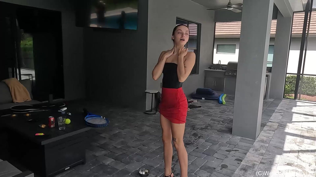 Kilo Takes a Dip in Her Red Mini Skirt and Black Top