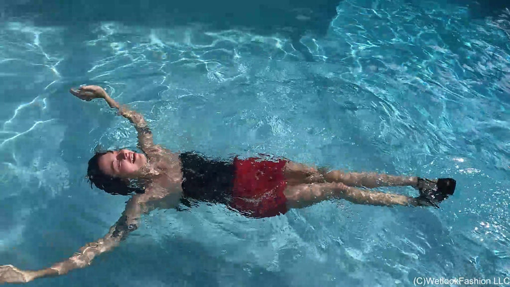 Kilo Takes a Dip in Her Red Mini Skirt and Black Top