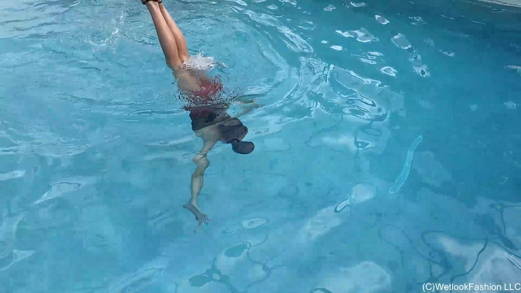 Kilo Takes a Dip in Her Red Mini Skirt and Black Top