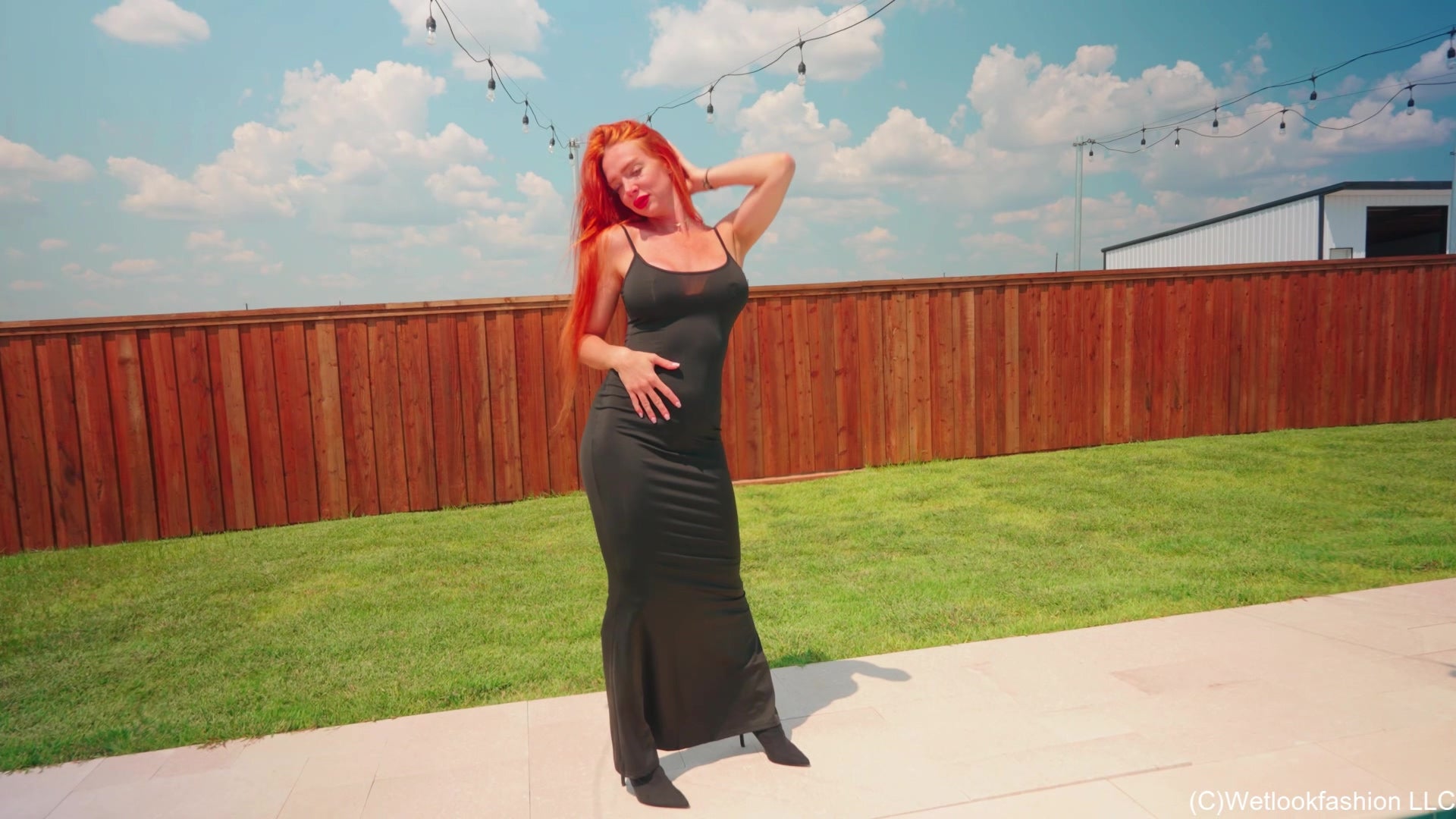 Krispeachi Swims in a Shiny Black Maxidress