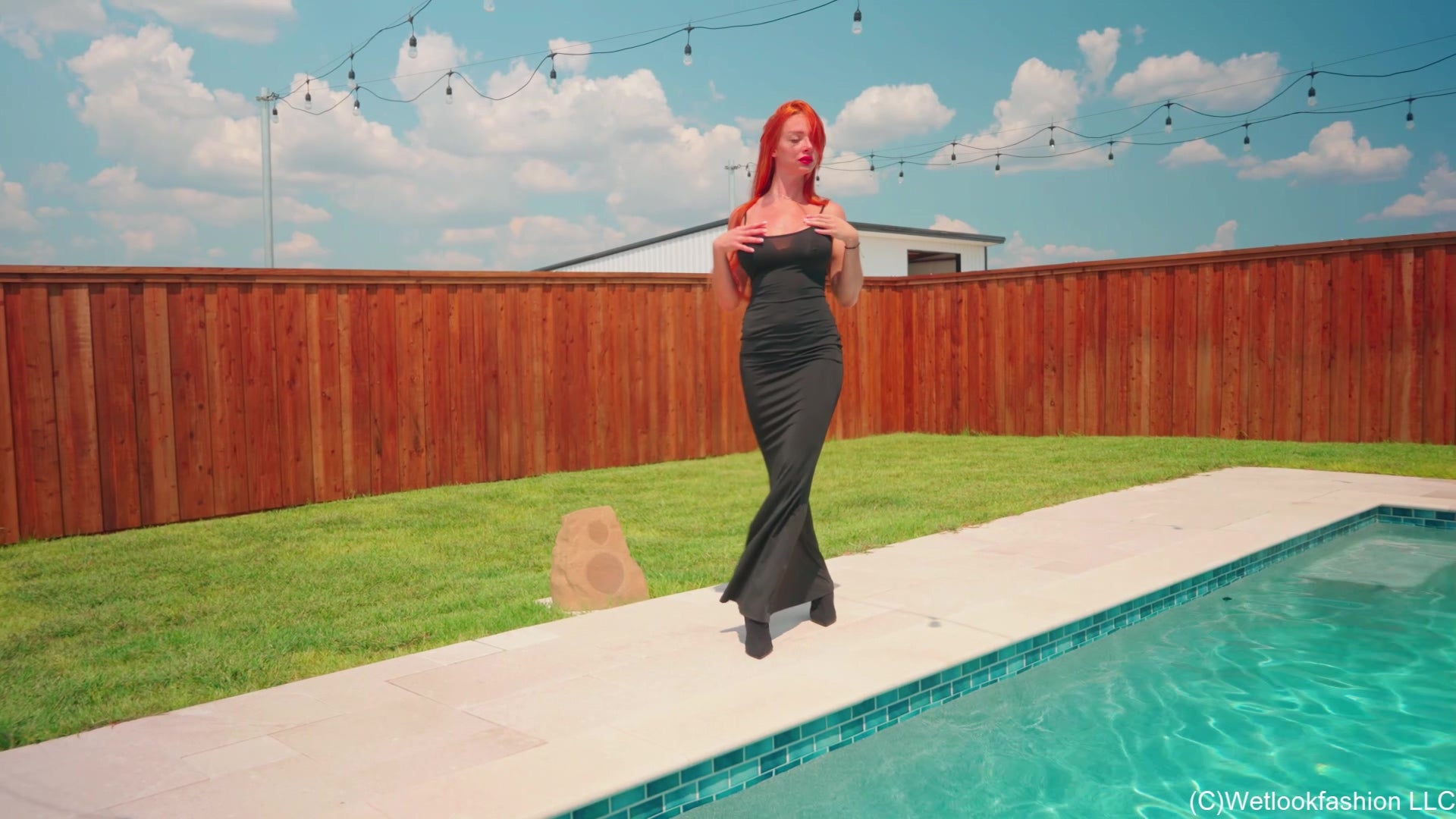 Krispeachi Swims in a Shiny Black Maxidress