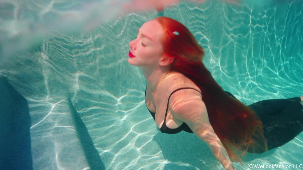 Krispeachi Swims in a Shiny Black Maxidress