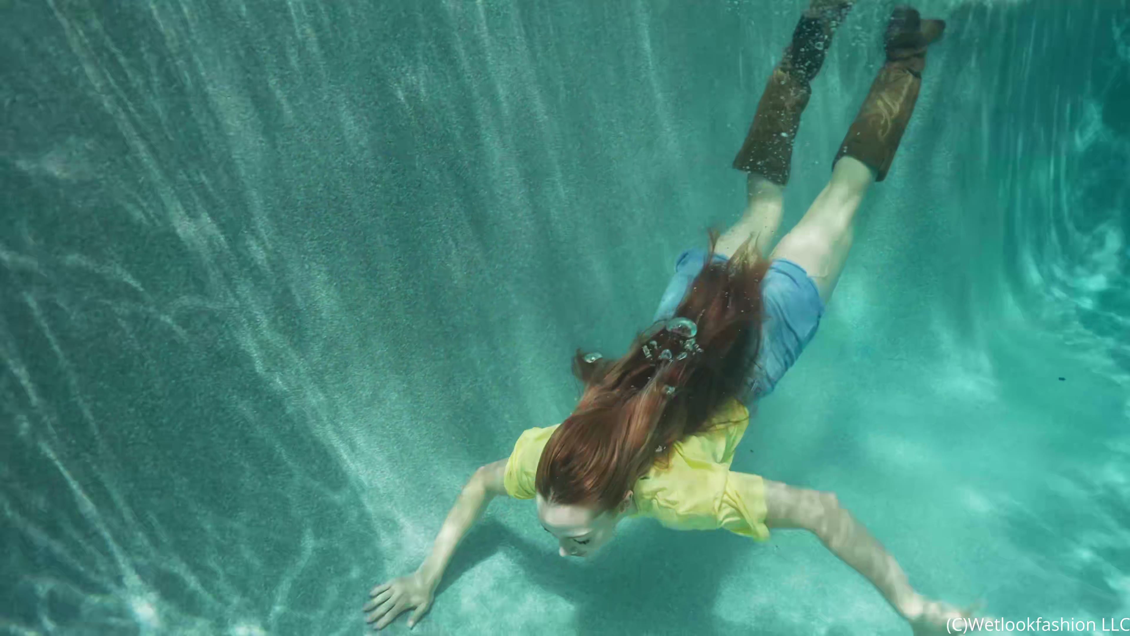 Krispeachi Swims in Jeans Shorts, T-Shirt and Boots