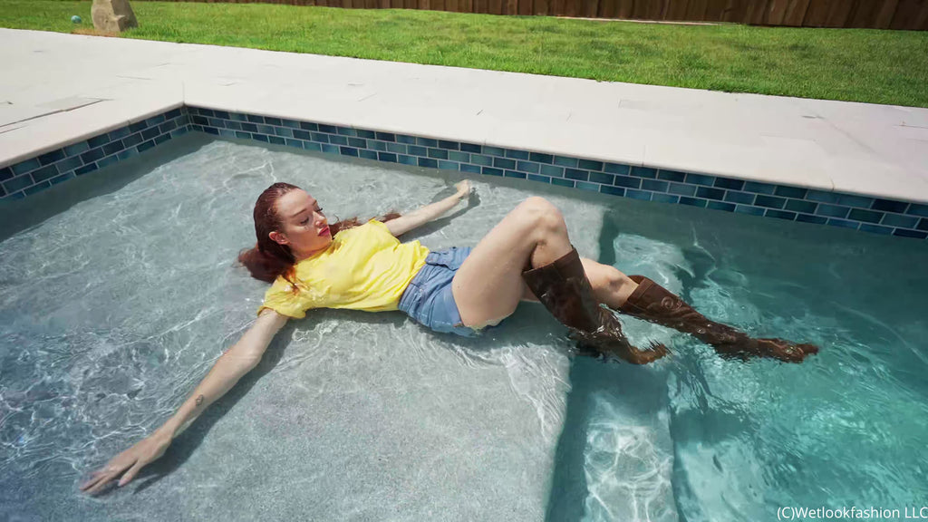 Krispeachi Swims in Jeans Shorts, T-Shirt and Boots