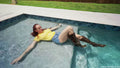 Krispeachi Swims in Jeans Shorts, T-Shirt and Boots
