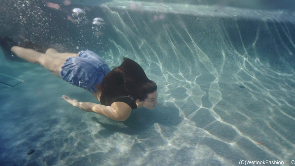 Kylie Gets Swims in Jean Shorts, Crop Top and Boots