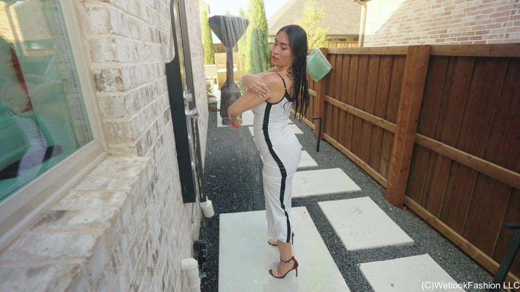 Kylie Soaks Her White Maxi Dress