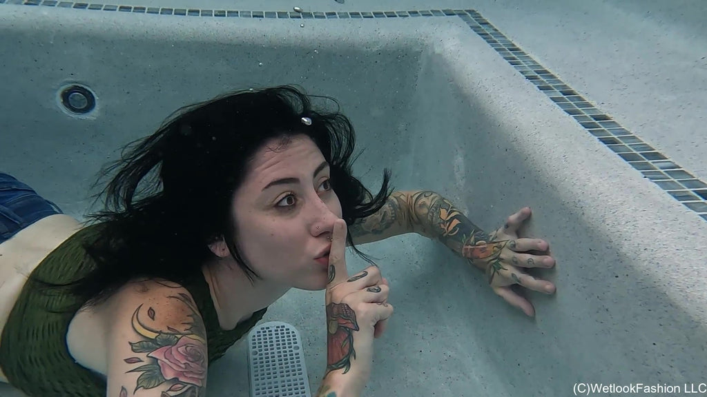 Lexie in the Pool Wearing Jeans, Crop Top and Flip Flops