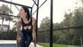 Lexie in the Pool Wearing Jeans, Crop Top and Flip Flops
