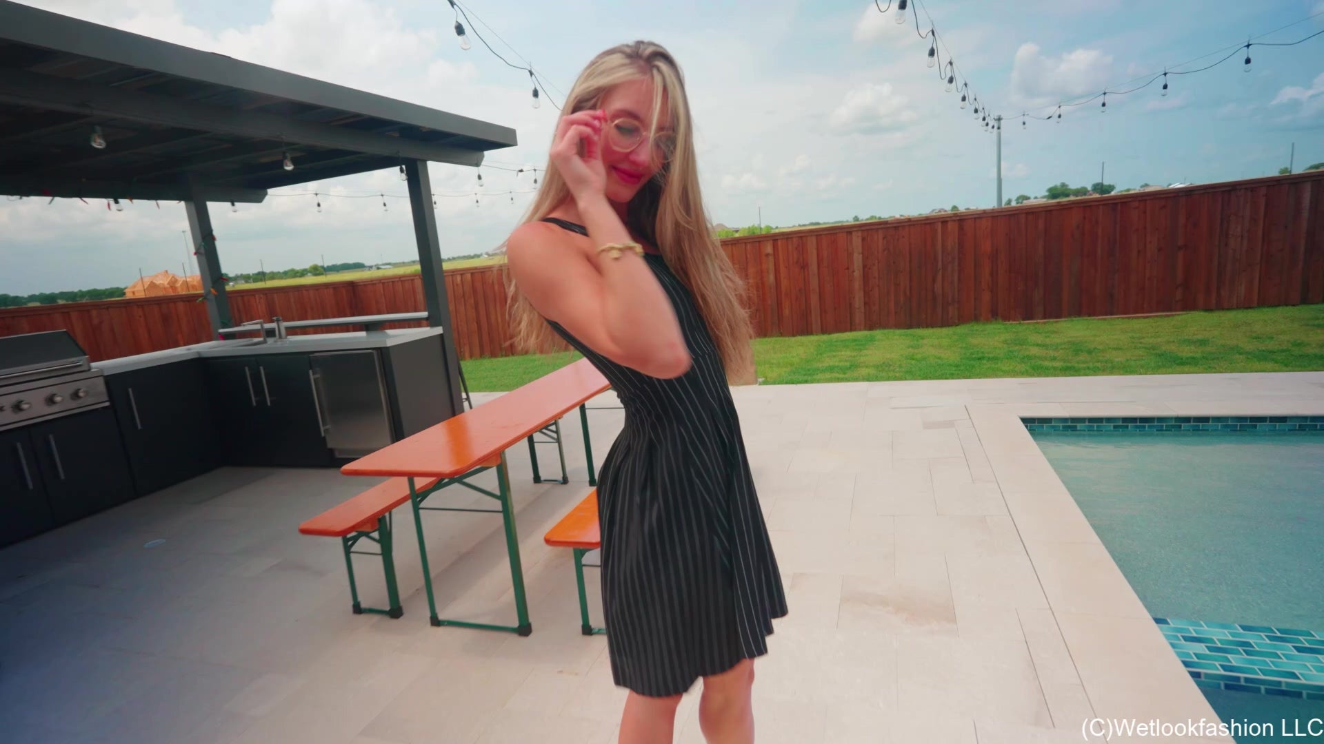 Lila Soaks Her Black Dress in the Pool