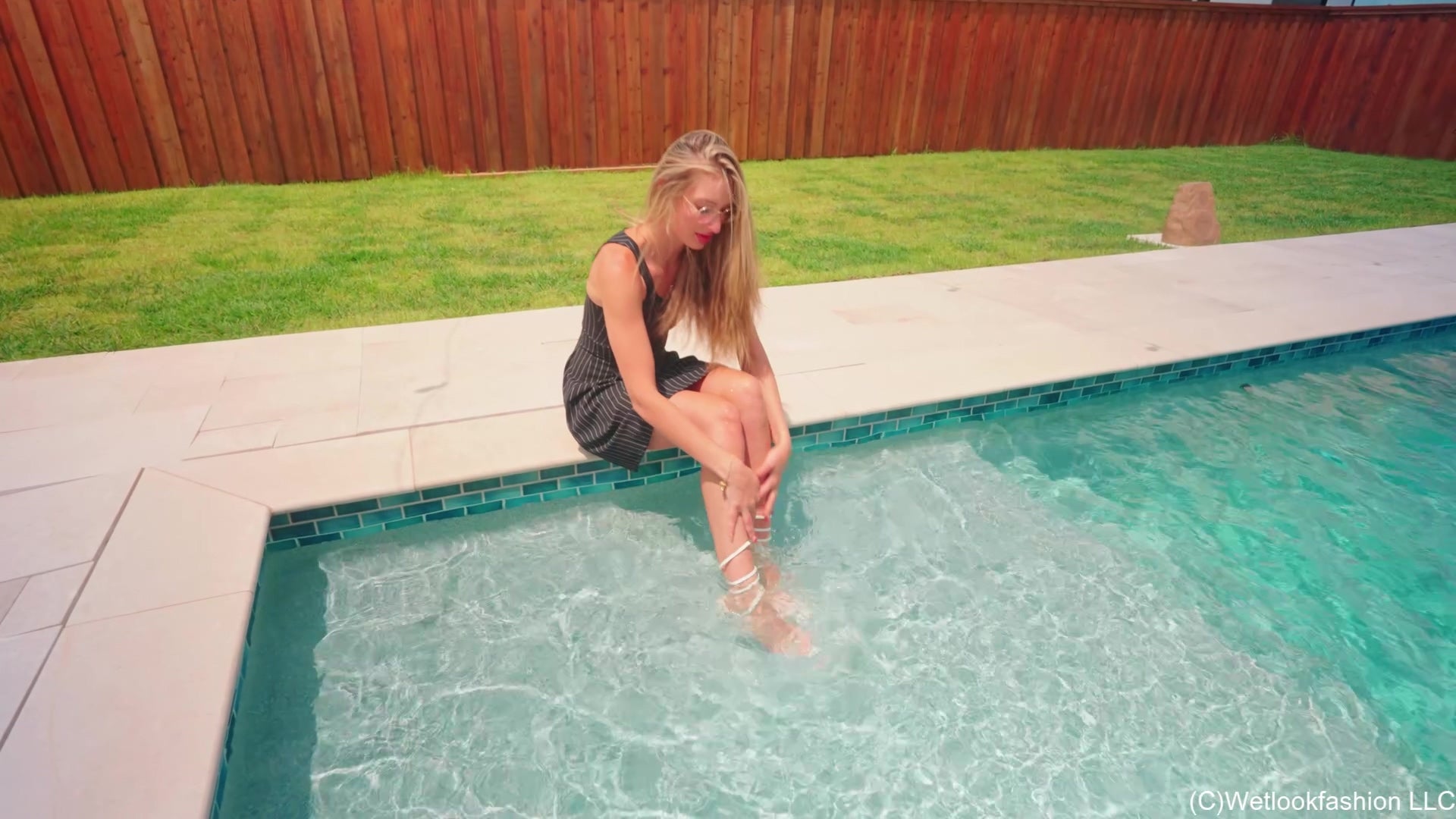 Lila Soaks Her Black Dress in the Pool