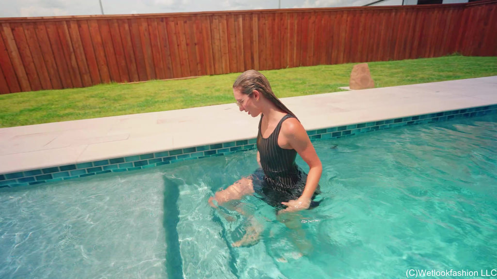 Lila Soaks Her Black Dress in the Pool