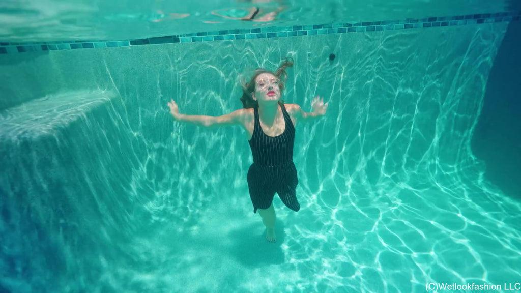 Lila Soaks Her Black Dress in the Pool