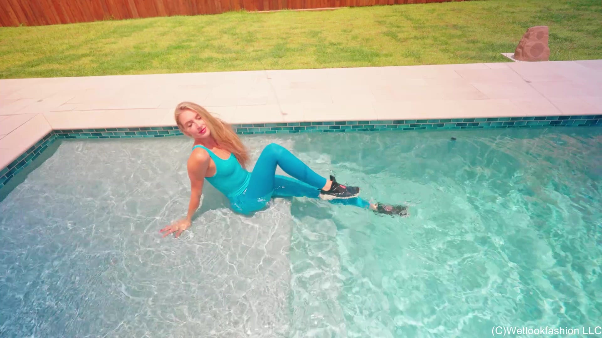 Lila Soaks Her Skin Tight Jumpsuit