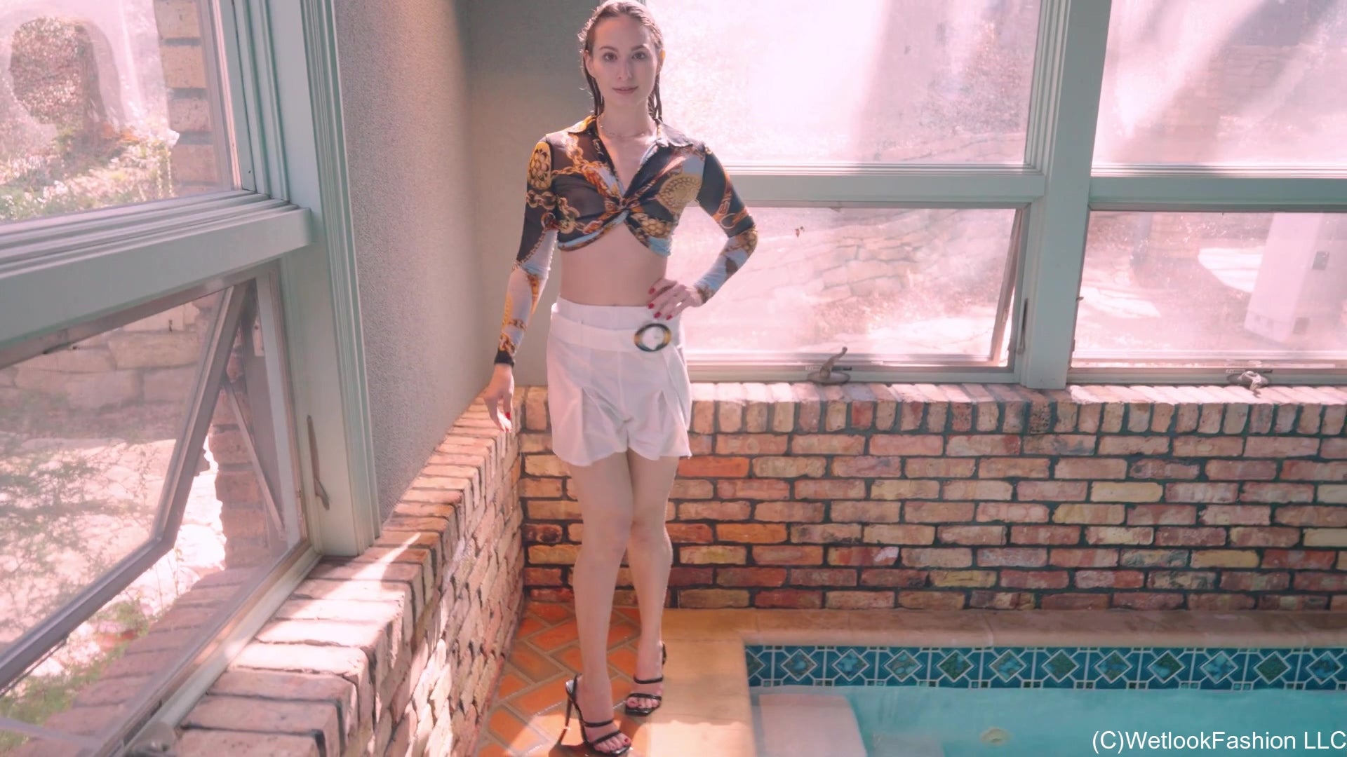 Lilith Relaxing in the Pool Wearing Shorts, Top and Heels