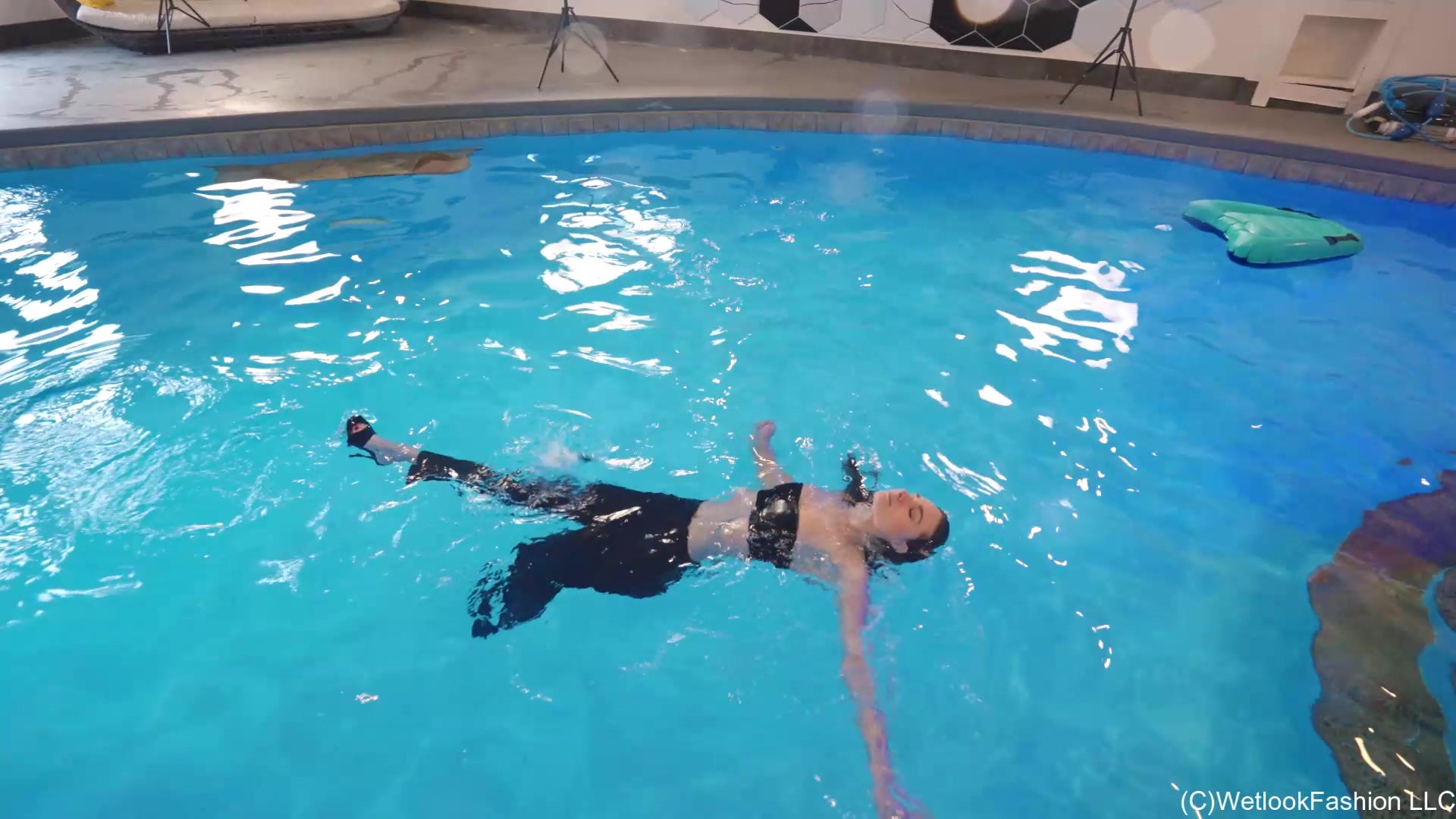 Lilith Rocks the Pool in Leather Pants and a Tube Top